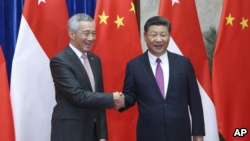 新加坡总理李显龙与中国国家主席习近平9月20日在人民大会堂举行会晤