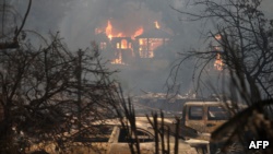 加州格伦·艾伦的一处住在毁于失控的野火。（2017年10月9日）